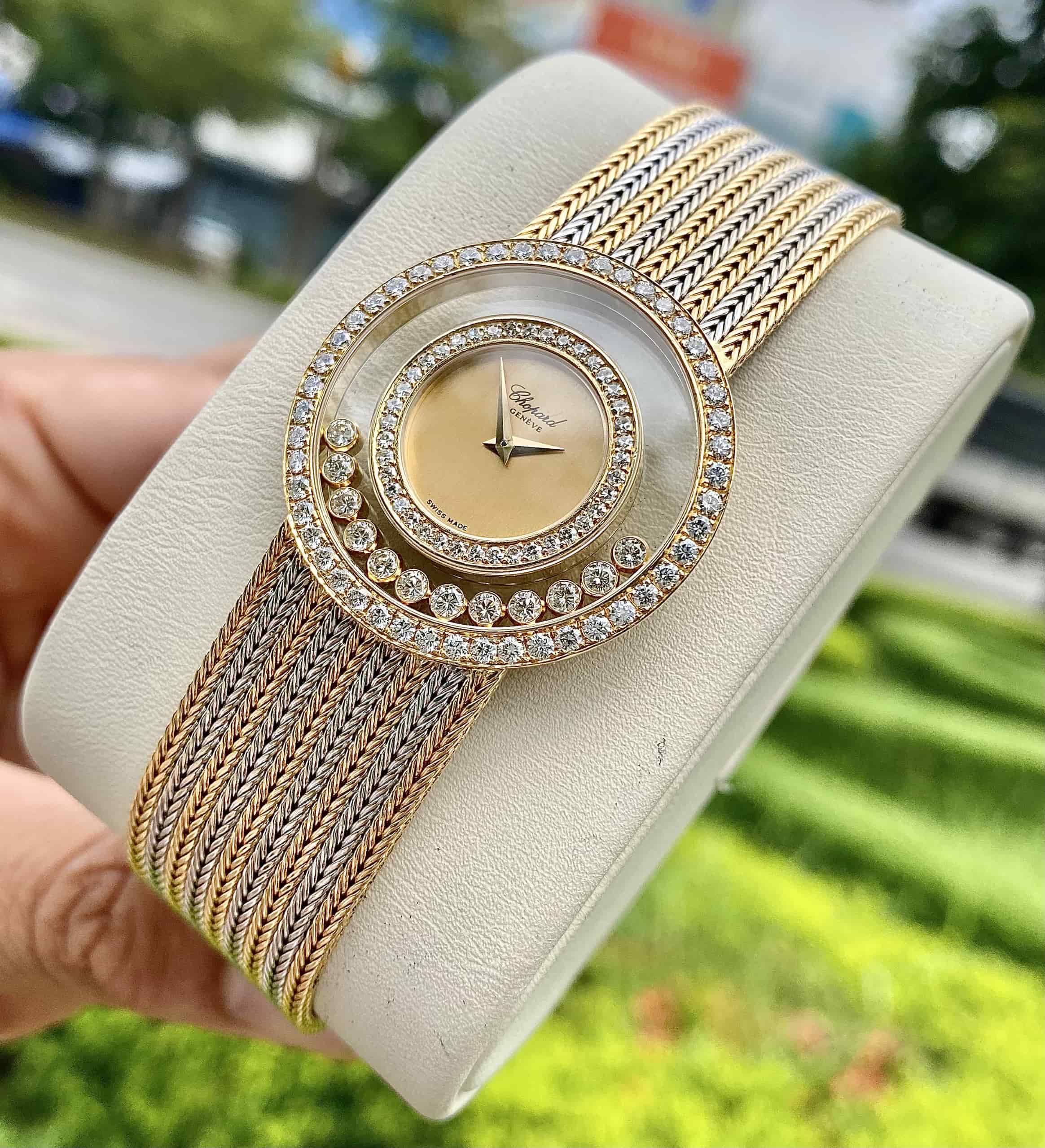 CHOPARD. AN 18K TWO COLOURED GOLD DIAMOND 1159